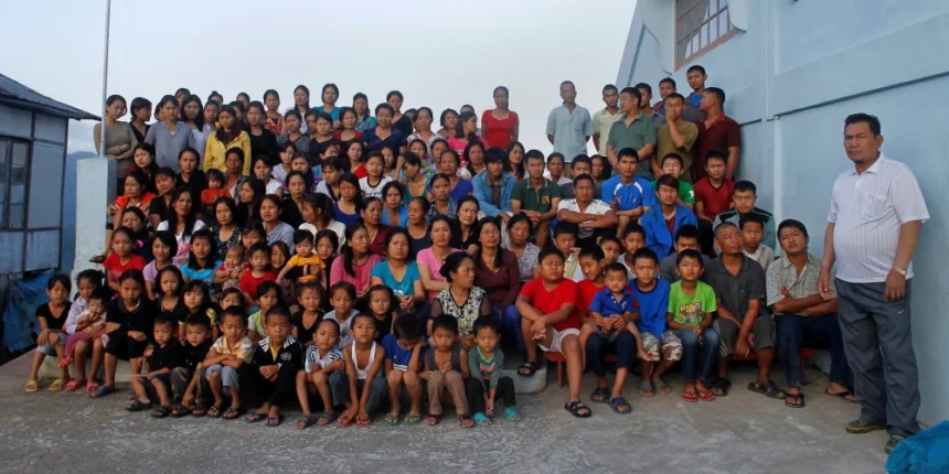 Ziona Chana's family members pose for group photograph outside their home in Oct. 7, 2011